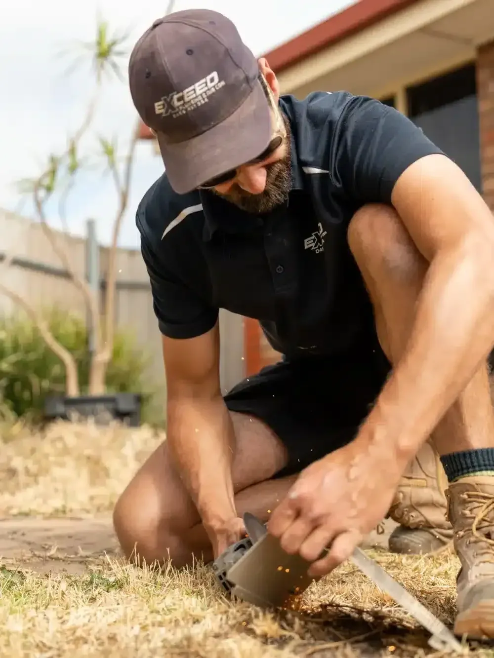 A Modbury Heights plumber at work on a job